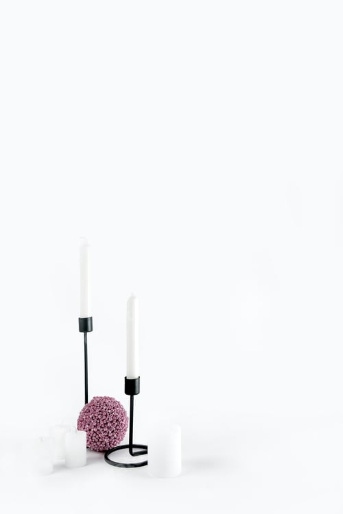 Preview: Candles and Decorative Ball on White Surface