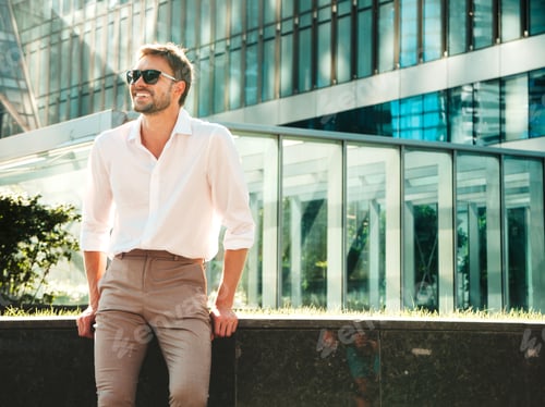 Preview: Handsome man posing outdoors
