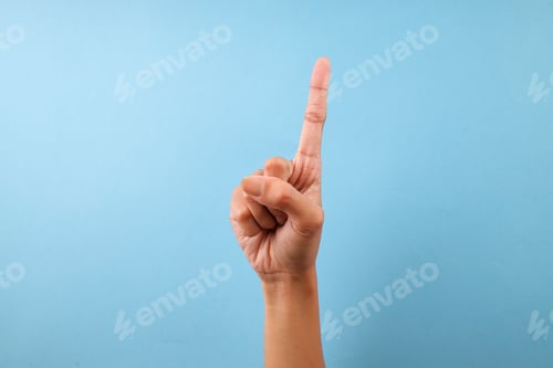 Preview: Woman Showing Letter Z Alphabet in American Sign Language Isolated On Blue Background