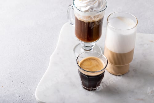 Preview: Variety of coffee or espresso drinks in different glasses
