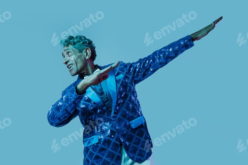 Preview: Senior man posing in studio.