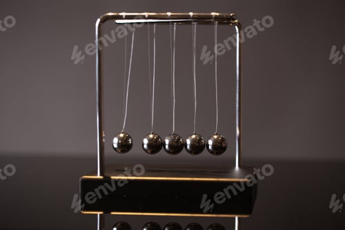 Preview: Newton cradle representing momentum
