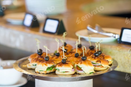 Preview: Delicious Appetizer Sandwiches on a Silver Platter