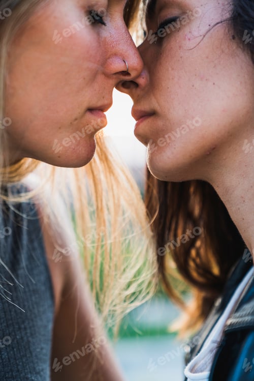 Preview: Close-up of affectionate lesbian couple about to kiss