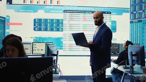 Preview: Business investor reviewing latest budgeting plans on big screen with reports