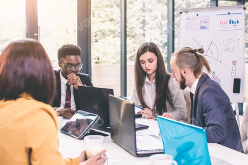 Preview: Group of business people working on business project in modern office
