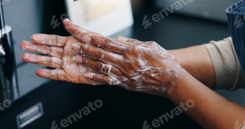 Preview: Person, soap and washing hands for hygiene, germ or bacteria removal by tap or sink at home. Closeu