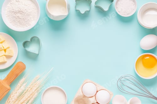 Preview: Ingredients for baking on light blue background.