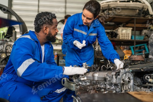 Preview: Team Auto mechanic are checking and repair maintenance auto engine