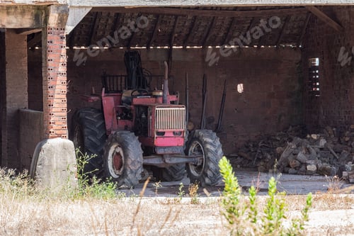 Preview: Agricultural tractor parked in a warehouse
