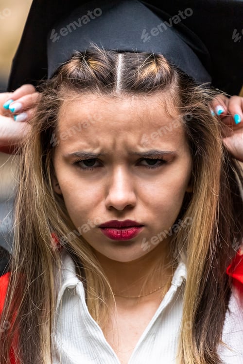 Preview: Close-up photo of young student looking at the camera seriously