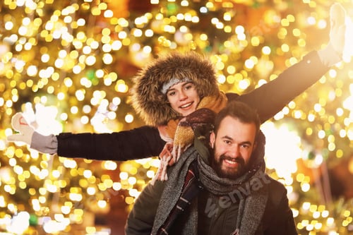 Preview: Adult couple hanging out in the city during Christmas time