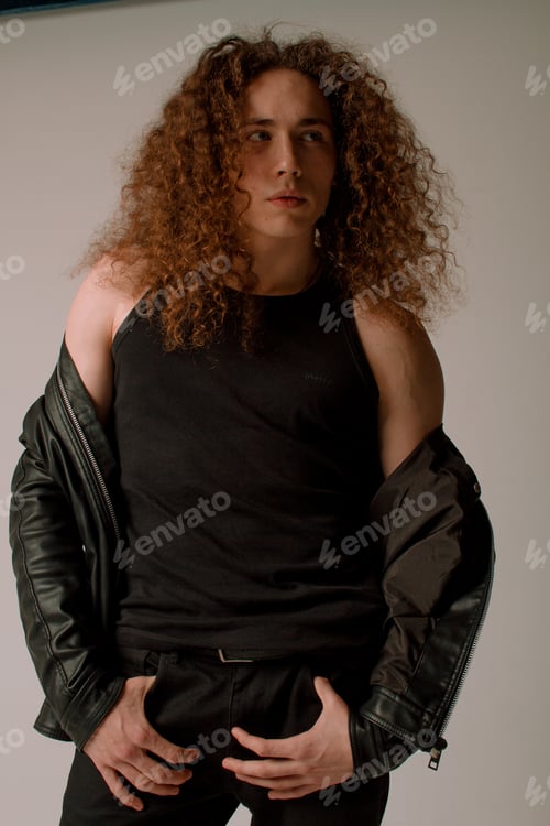 Preview: Attractive And Stylish Guy With Curly Hair And A Sports Figure