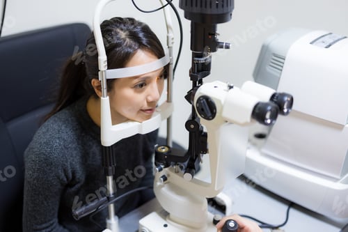 Preview: Woman visiting clinic for eye check