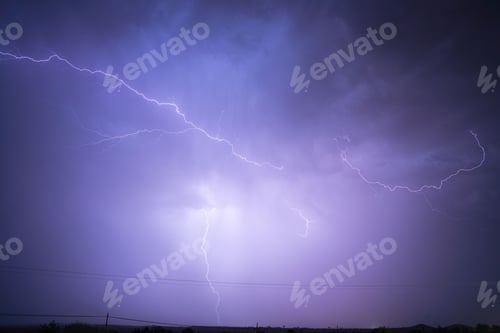 Preview: an image of a lightning bolt above the ground in the sky