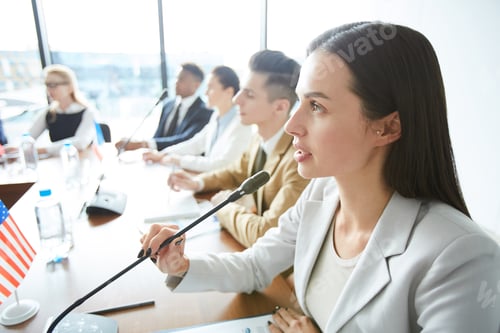 Preview: Confident female politician speaking into microphone