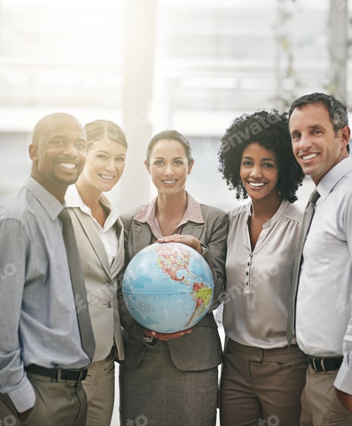 Preview: Cropped portrait of a businesswoman holding a globe while standing with her colleagues