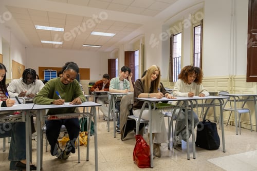 Preview: Diverse high school students writing during class