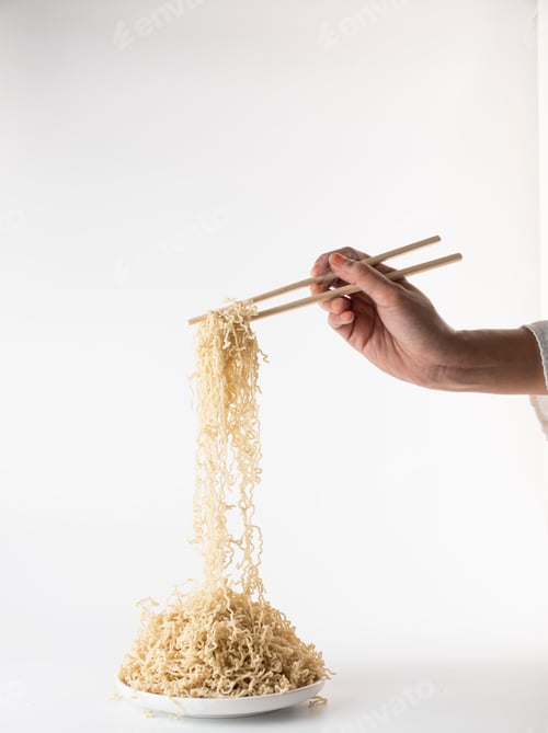 Preview: Noodles with Chopsticks on a White Background