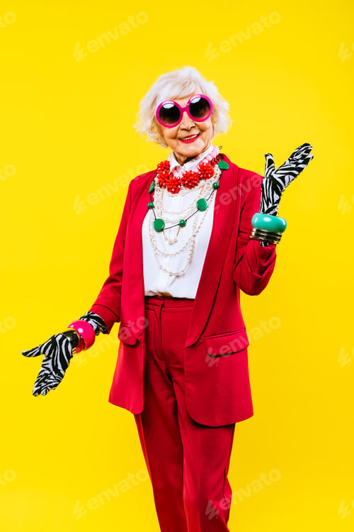 Preview: Cool and stylish senior old woman with fashionable clothes