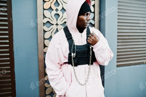 Preview: Stylish urban style african american man in pink hoodie