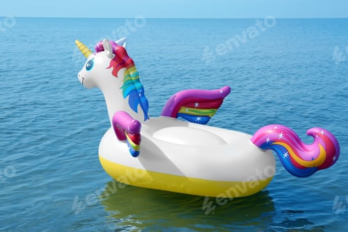 Preview: Funny inflatable unicorn ring floating on sea water. Summer vacation