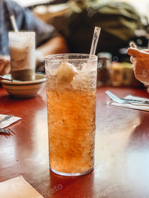 Preview: Ice tea on a table in a diner restaurant. debb_a/food