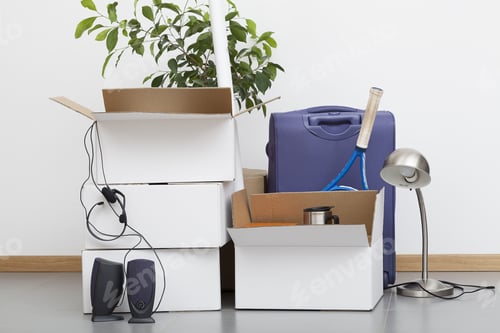 Preview: A Pile Of Cardboard Boxes Ready For Moving House