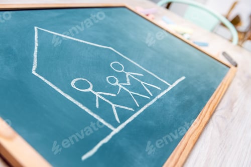 Preview: family in quarantine drawn on a blackboard