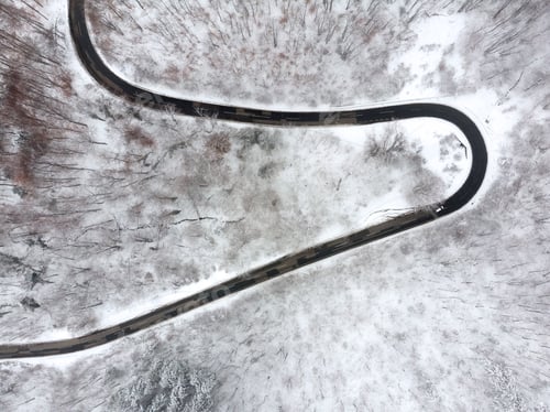 Preview: Winter Mountain Forest Aerial Shot, Woods Covered with Snow and Fog. Cold January morning.