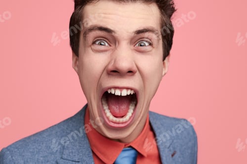 Preview: Angry male entrepreneur screaming at camera