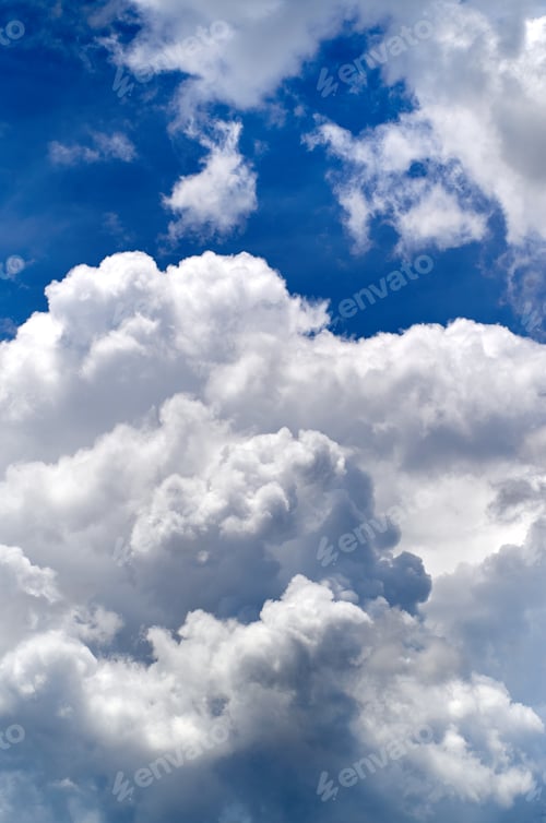 Preview: Blue sky with fluffy clouds