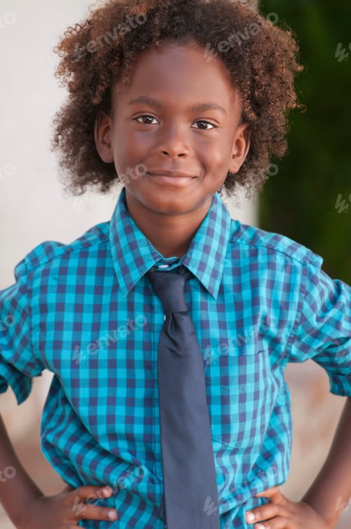 Preview: Portrait of young boy, outdoors, hands on hips