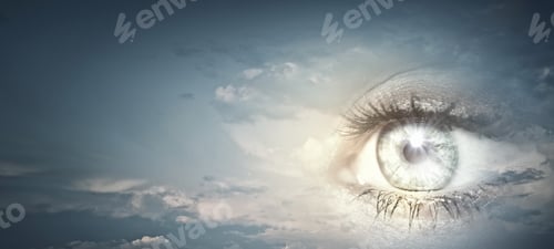 Preview: Female Clear Eye On Blue Sky Background