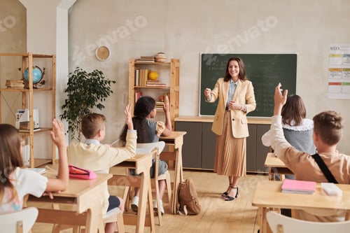 Preview: Kids Raising Hands in School