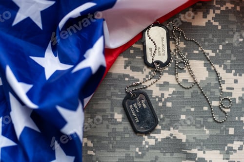Preview: Army tokens on military uniform and USA national flag background.