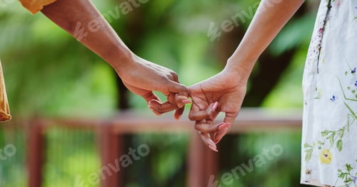 Preview: Holding hands, couple and outdoor with pinky promise for commitment, loyalty and trust together. Pa