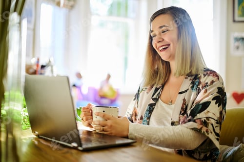 Preview: Laptop, coffee and laughing woman in home for social media, funny meme and online browsing. Tea, re