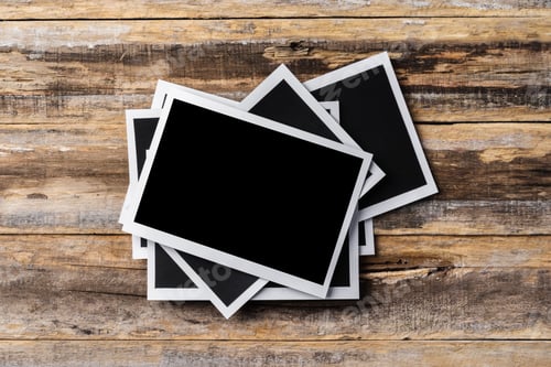 Preview: Blank photo frames for your photos on wooden background