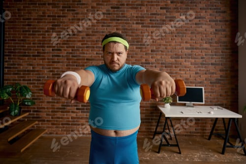 Preview: Portrait of serious comic man with obese figure doing workout with dumbbells