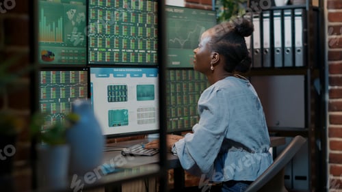 Preview: Cheerful woman celebrating successful financial achievement
