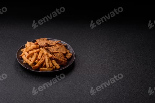 Preview: Croutons or crackers made from rye bread with garlic, salt, and spices. Croutons with salt