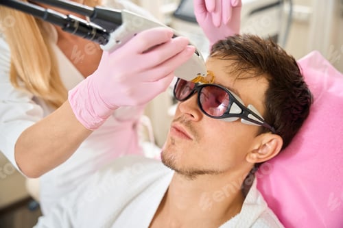 Preview: Beauty salon client undergoing laser facial hair removal procedure