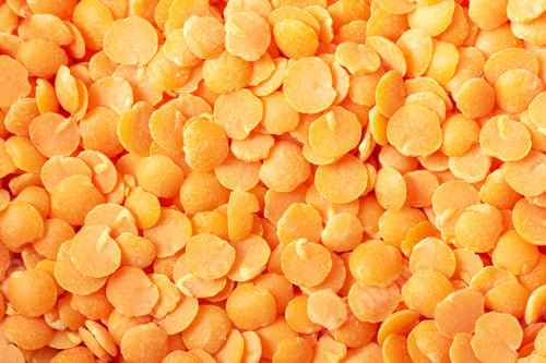 Preview: Red lentil background. Abstract food texture.