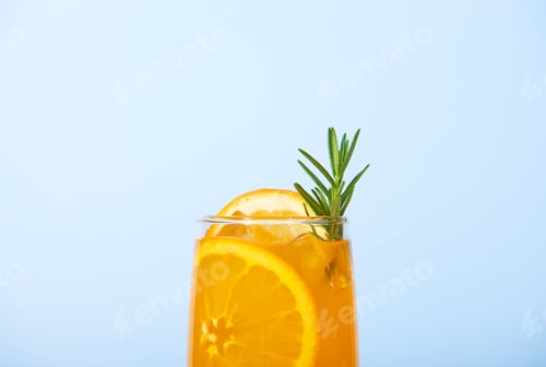 Preview: Closeup Glass of 100% Orange juice with orange slices fruits. Summer sea vacation and travel concept