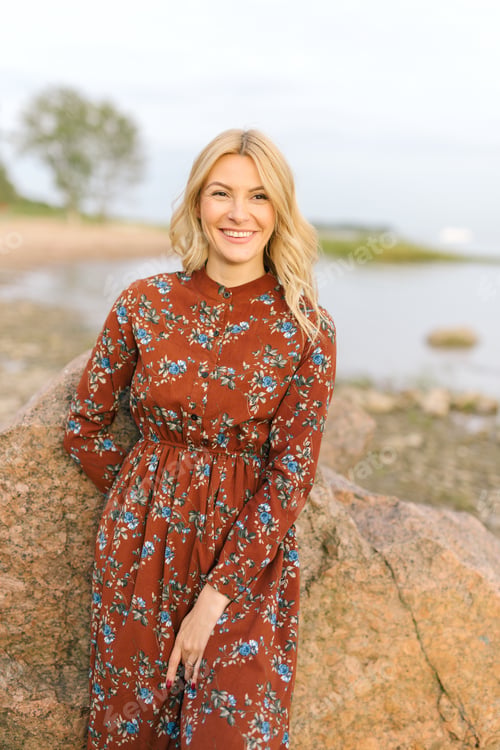 Preview: Attractive young woman in nature