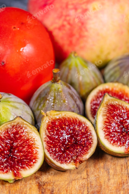 Preview: Closeup of figs with pomegranates and persimmons
