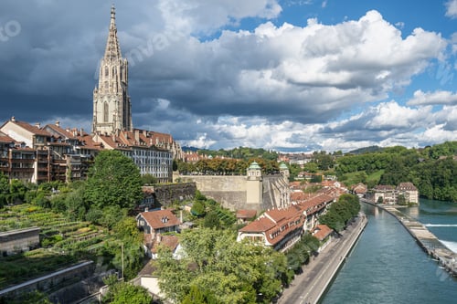 Preview: Bern Old Town skyline along Aare River with the distinctive spire of Bern Cathedral