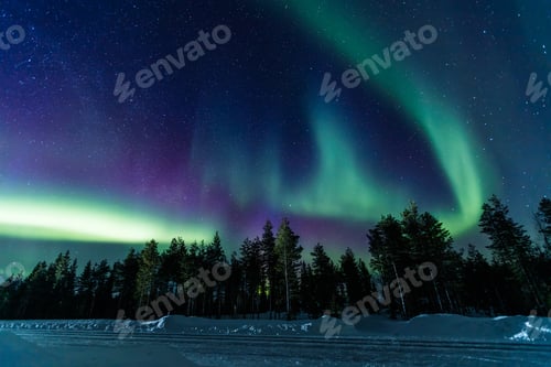 Preview: Northern lights Aurora Borealis activity over the road in Finland, Lapland