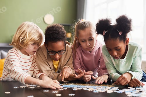 Preview: Group of Kids Playing with Puzzle